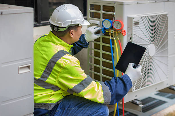 Professional Hvac technician working in Kingston, MA